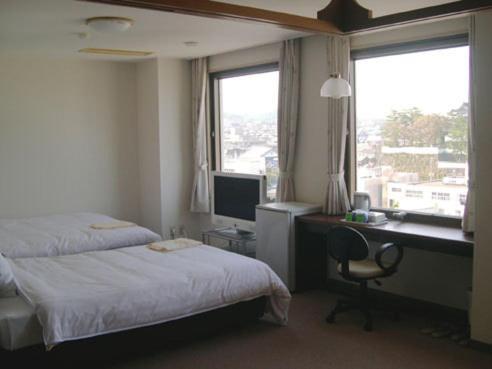 Shimabara Station Hotel Quarto foto