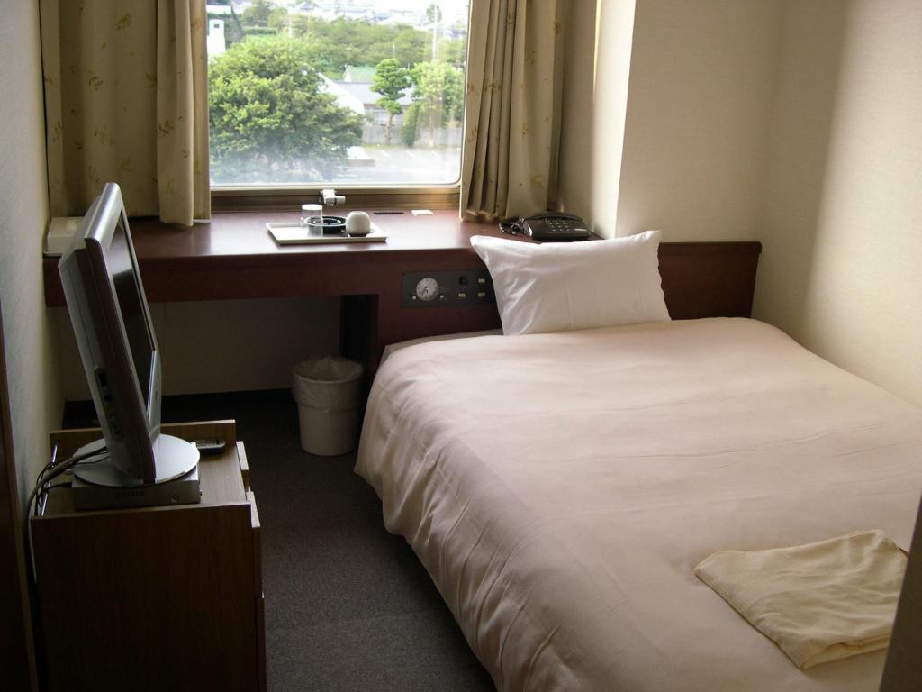 Shimabara Station Hotel Quarto foto